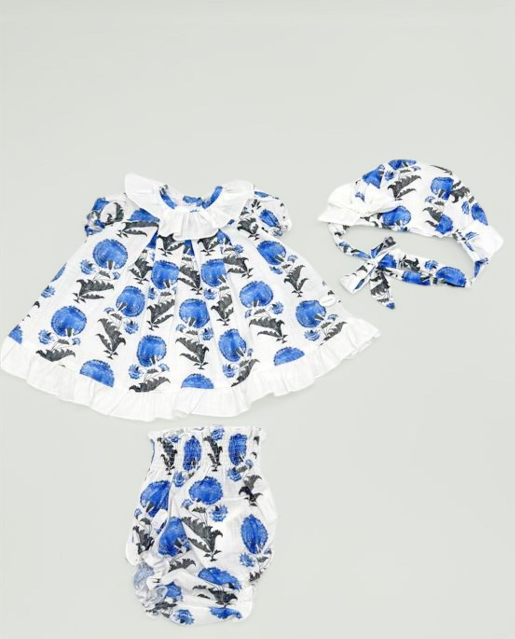 Conjunto vestido braguita y capota de flores azul bebé | Cocote by Charanga