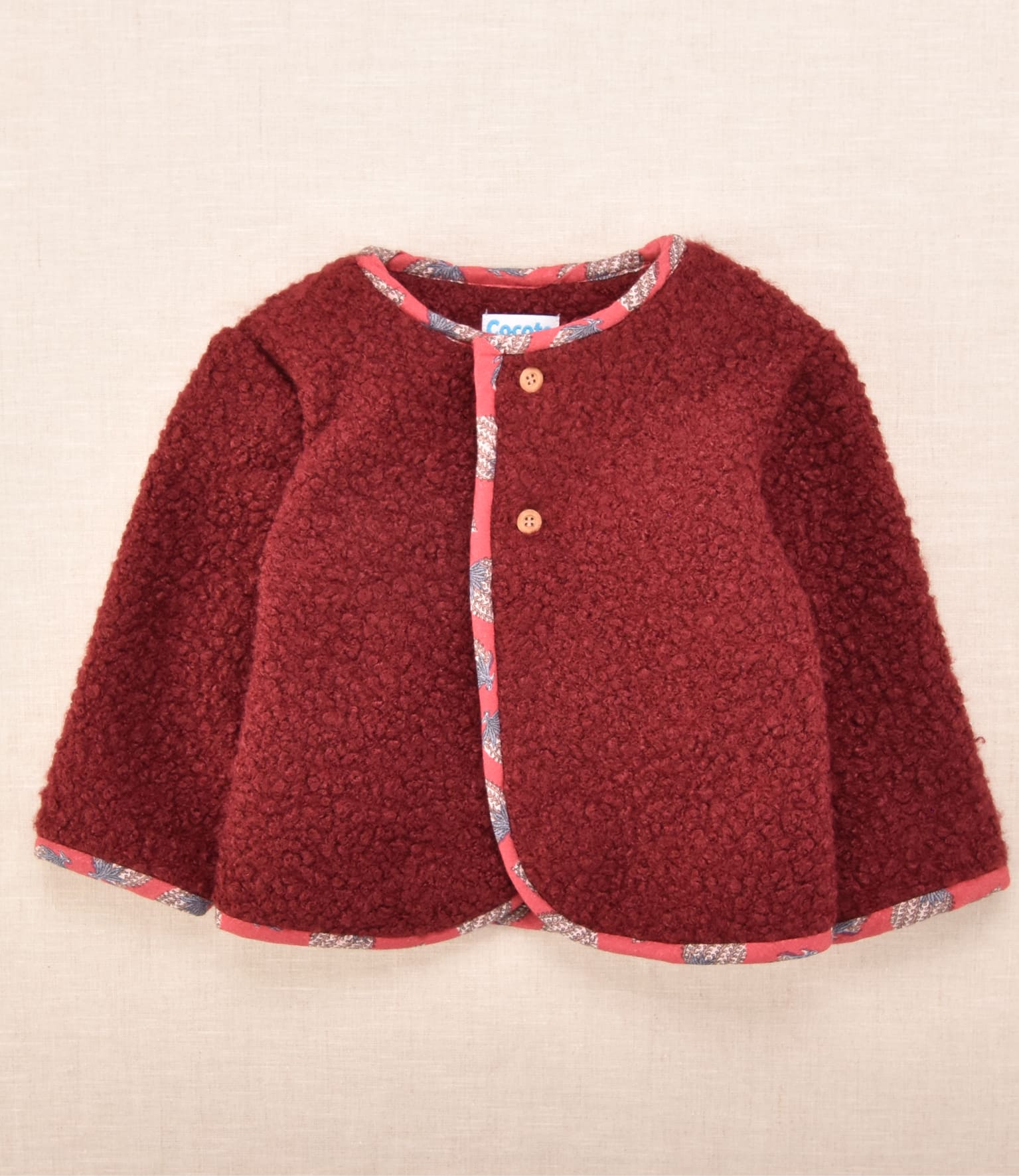 Chaqueta borreguito bebé burdeos vista frontal Cocote by Charanga 