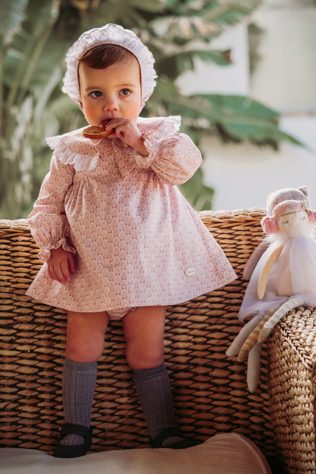 Conjunto vestido. braguita y capota de bebé rosa Cocote & Charanga