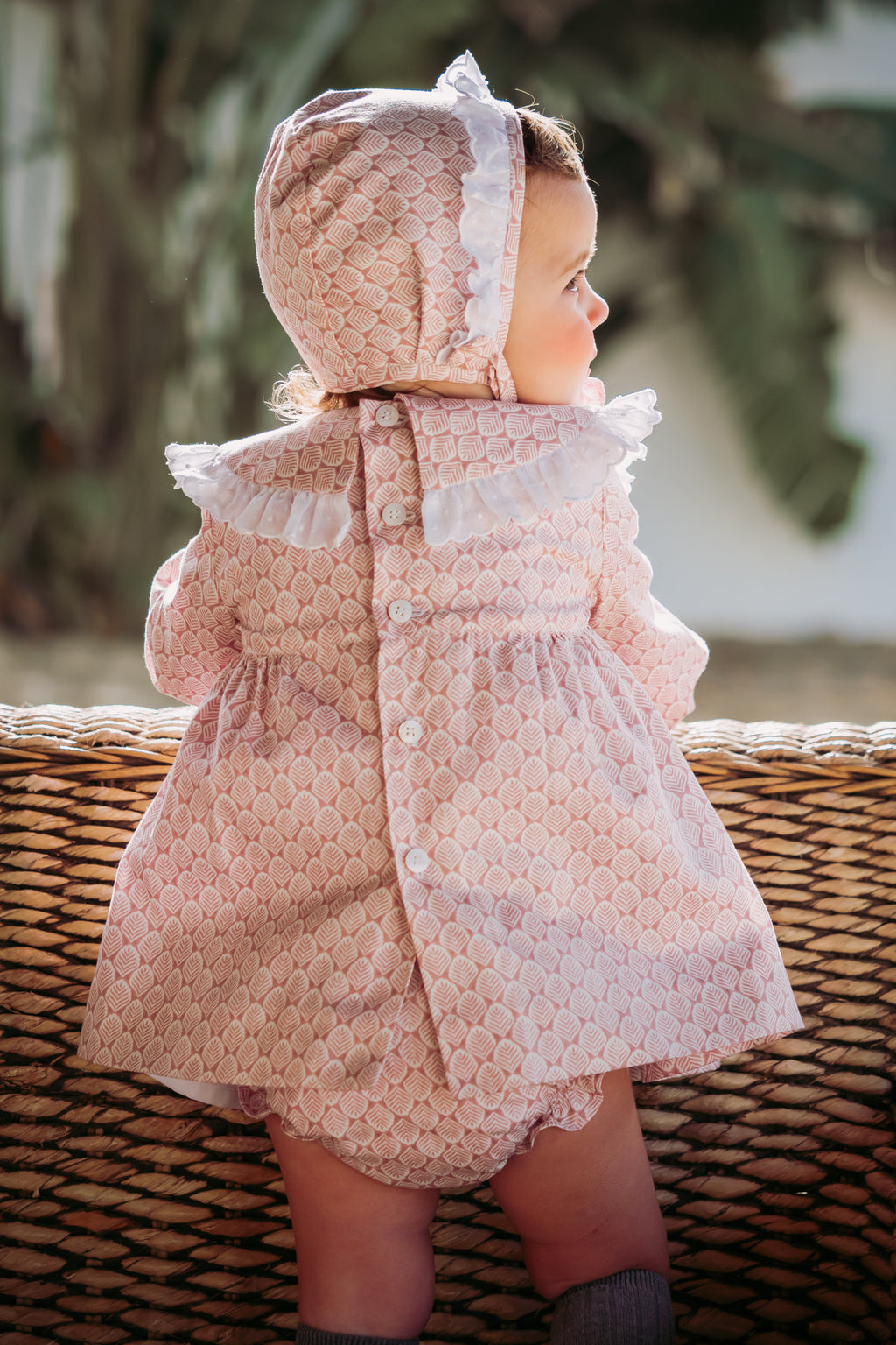 Conjunto vestido. braguita y capota de bebé rosa Cocote & Charanga