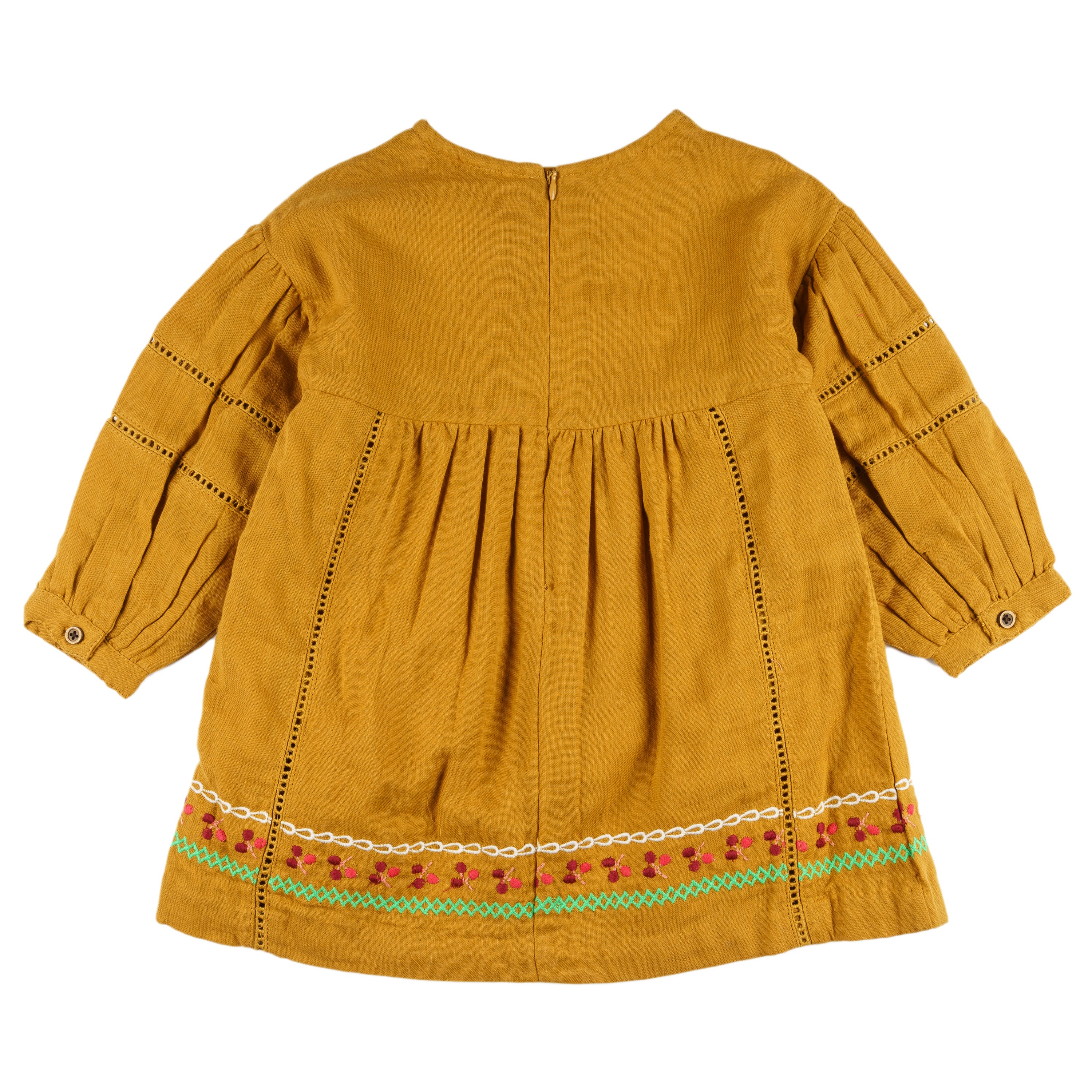 Vestido niña mostaza bambula bordado con borlas
