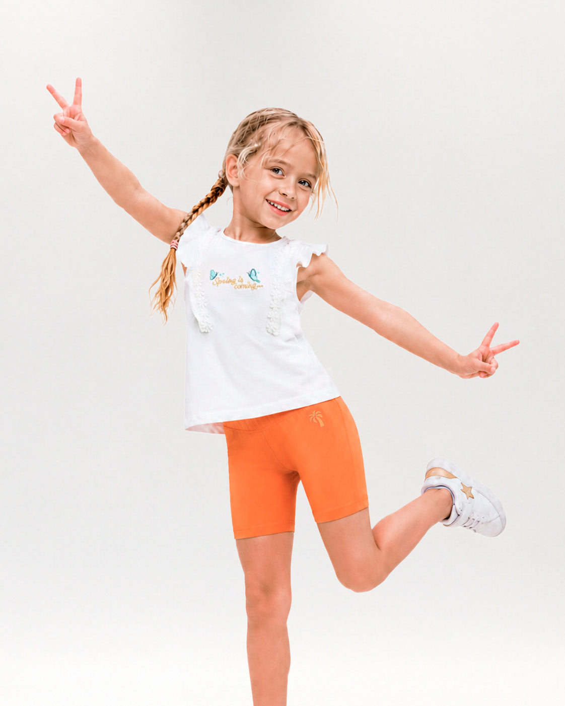 Shorts arancioni da bambina