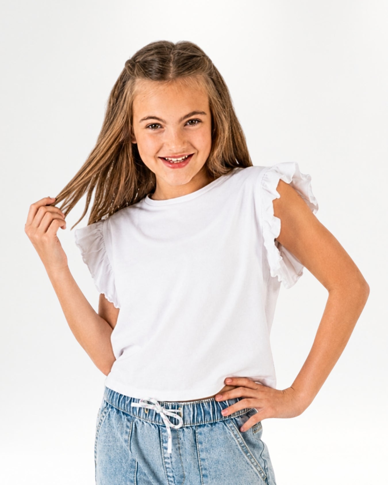 Camiseta de niña blanca manga corta volantes