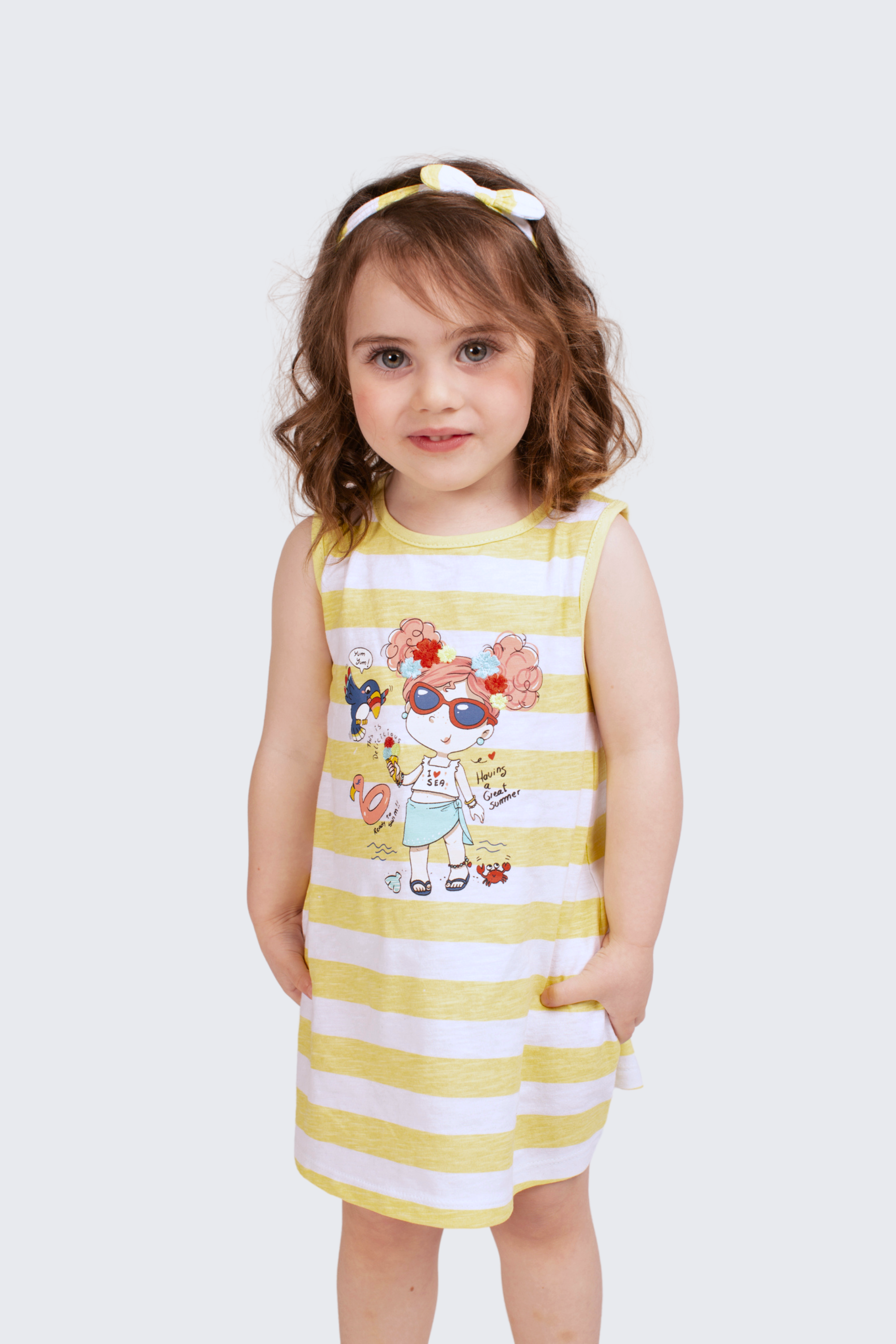 Vestido de bebé a rayas en color amarillo