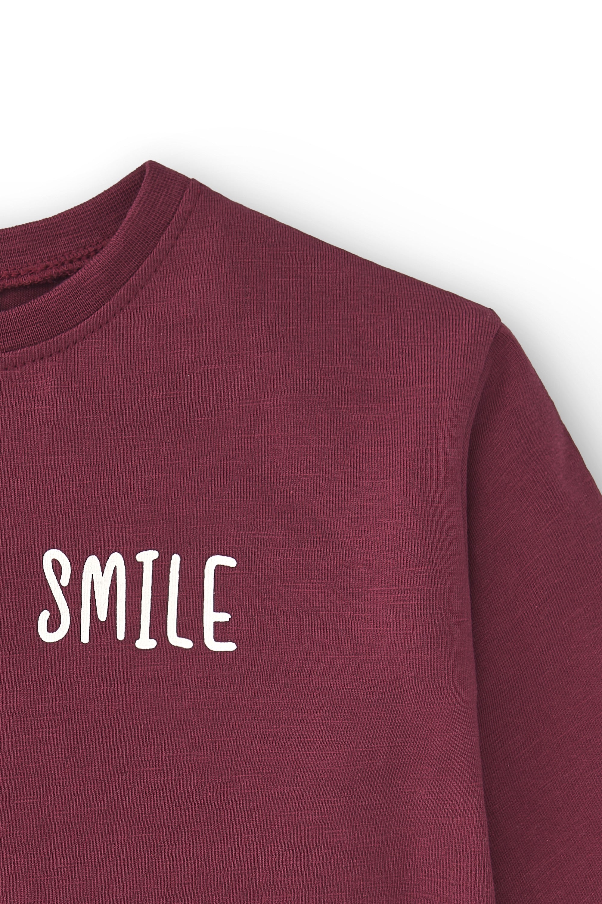 Camiseta de bebé básica en color burdeos smile Charanga